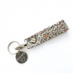 Llavero tira flores Liberty + chapa redonda personalizada